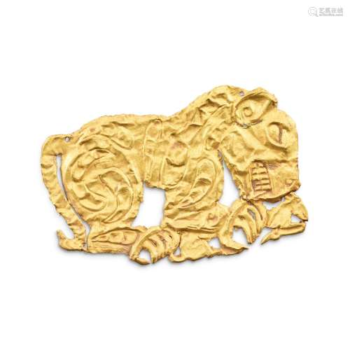 An Ordos repoussé gold sheet 'tiger' plaque, 3rd - 2nd centu...