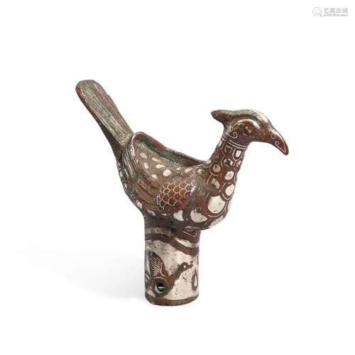 A silver-inlaid bronze 'bird' staff finial, Eastern Zhou dyn...