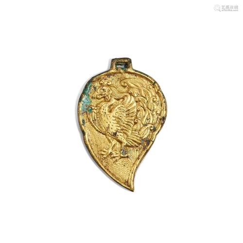 A gold repoussé leaf-form 'phoenix' plaque, Liao dynasty 辽 ...