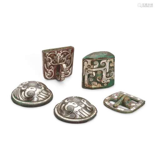 A group of five silver-inlaid bronze fittings, Eastern Zhou ...