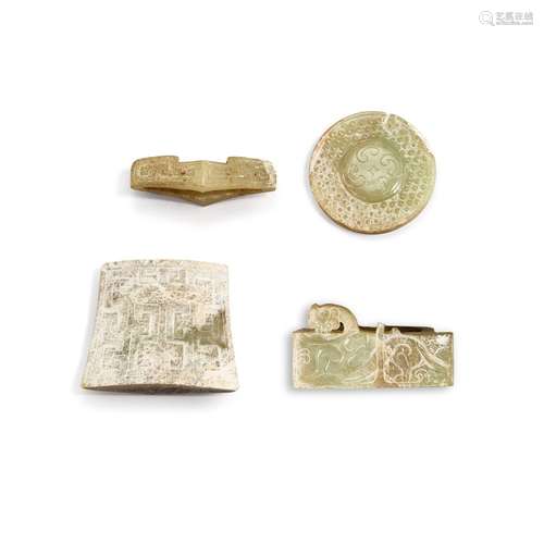 A group of four jade sword fittings, Han dynasty 汉 玉剑饰一...