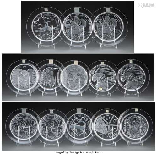 Thirteen Lalique Clear and Frosted Glass Annual Plates in Or...