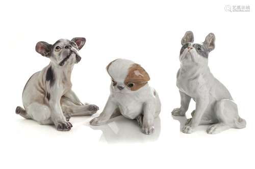 THREE DANISH PORCELAIN FIGURES OF DOGS