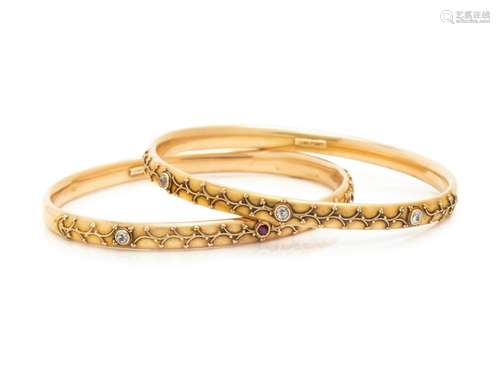 PAIR OF YELLOW GOLD AND DIAMOND BANGLE BRACELETS