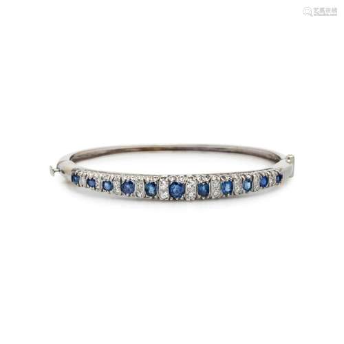 WHITE GOLD, SAPPHIRE AND DIAMOND BANGLE BRACELET