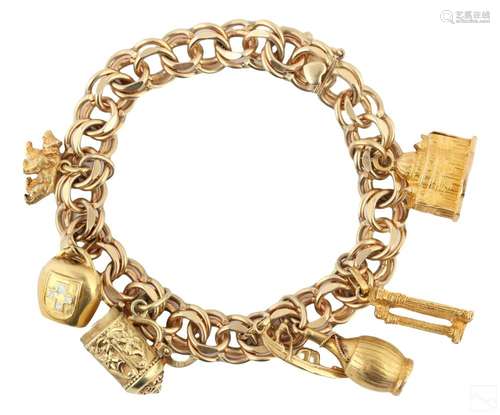 14K Gold Vintage Charm Bracelet with 7 Charms 43g.