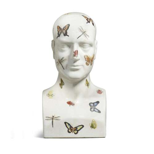 A CRACKLE GLAZED CERAMIC BUST DECORATED WITH BUTTERFLIES AND...