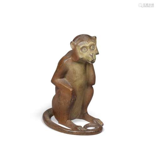 A PAINTED CAST IRON MONKEY DOORSTOP early 20th century, with...