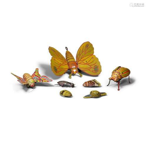 A GROUP OF SEVEN PAINTED METAL MECHANICAL INSECT TOYS early ...