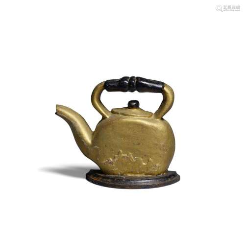 A COLDWATER FOUNDRY CAST IRON TEAPOT DOORSTOP early 20th cen...