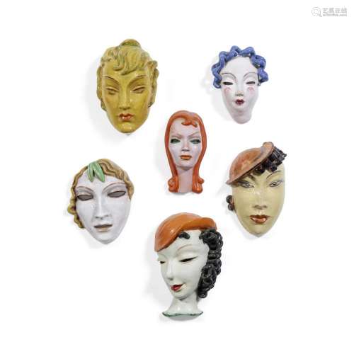 A GROUP OF SIX GERMAN AND AUSTRIAN FIGURAL CERAMIC MASKS ear...