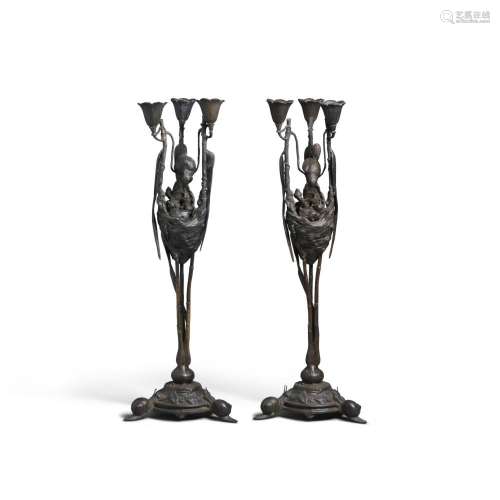 A PAIR OF FRENCH BRONZE CANDELABRA WITH BIRDS' NESTS aft...