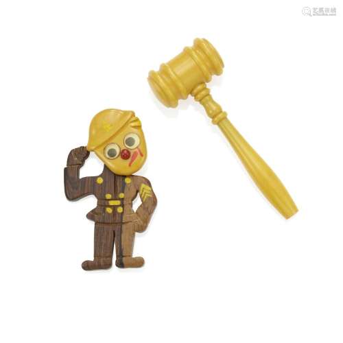 A BAKELITE POLICEMAN BROOCH AND GAVEL the brooch with a wood...
