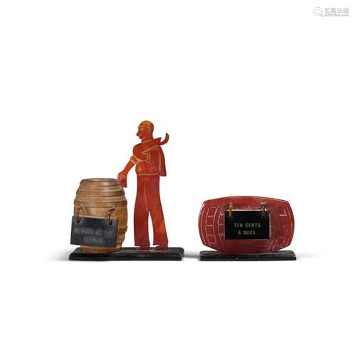 TWO BAKELITE FIGURAL RECIPE STANDS with a red barrel stand a...