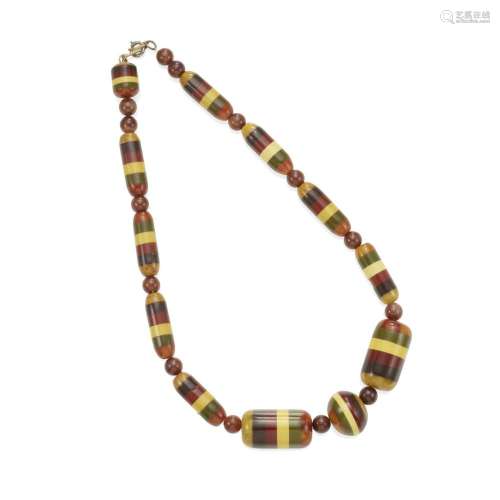 A BAKELITE NECKLACE WITH LAMINATED MULTI-COLOR BEADS IN VARI...