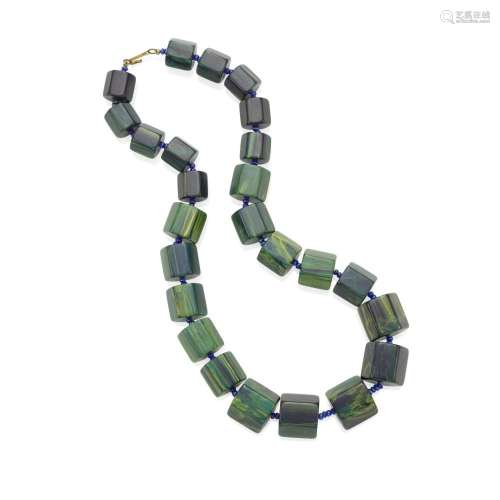 A BAKELITE NECKLACE with large blueish green and yellow bead...