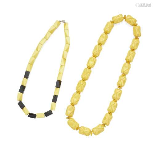 TWO BAKELITE BEAD NECKLACES one with black and cream geometr...