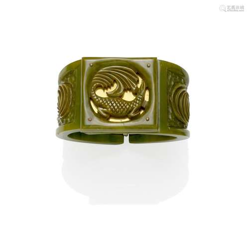 A CARVED HINGED BRACELET WITH REPTILIAN DESIGN IN GREEN leng...