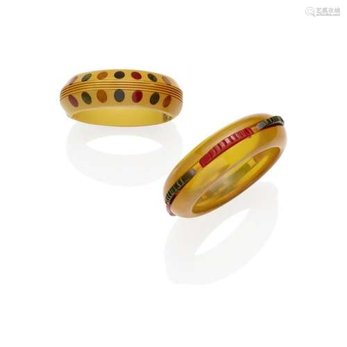 TWO RARE MULTICOLOR BAKELITE BRACELETS comprising one hinged...