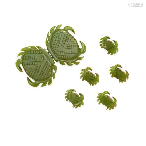 A GROUP OF SEVEN GREEN BAKELITE CRABS likely from a belt, th...