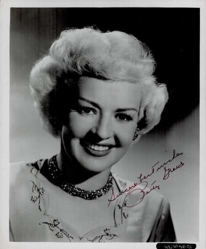 Betty Grable signed vintage 10x8 black and white photo. Good...