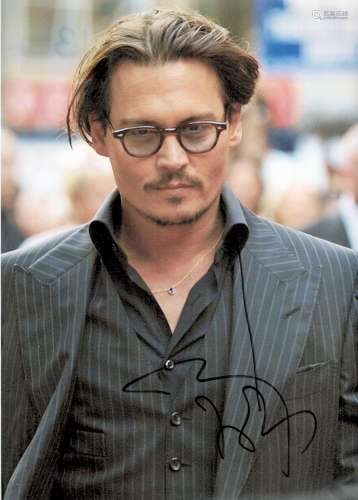 Johnny Depp signed 12x8 colour photo. Good condition. All au...