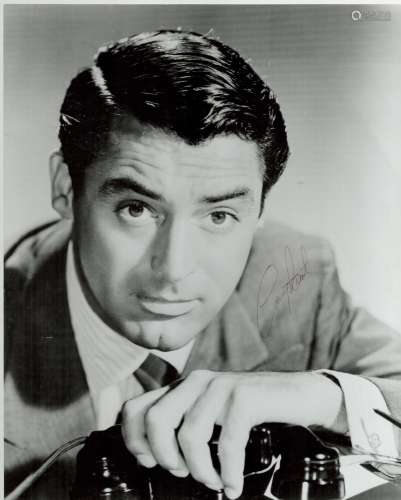 Cary Grant signed 10x8 black and white vintage photo. Good c...