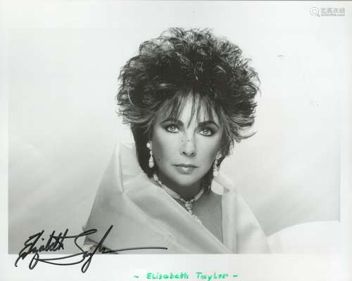 Elizabeth Taylor signed 10x8 black and white photo. Good con...