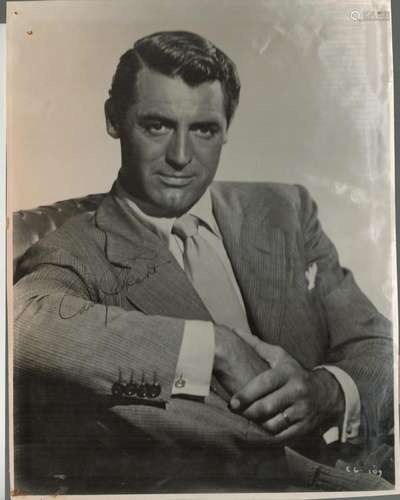 Cary Grant signed 10x8 black and white vintage photo. Good c...