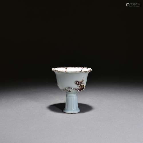 A Chinese White-glazed underglaze red-carved porcelain croco...