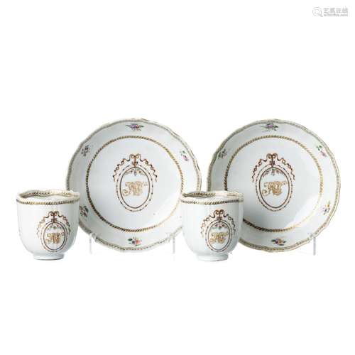 Pair of Chinese porcelain monogrammed cups and saucers, Qian...