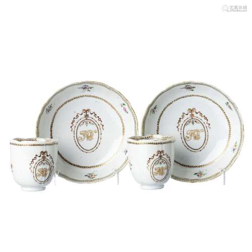 Pair of Chinese porcelain monogrammed cups and saucers, Qian...