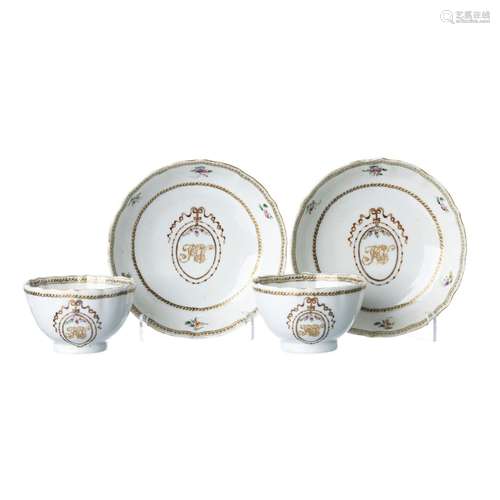 Pair of Chinese porcelain monogrammed tea cup and saucer, Qi...