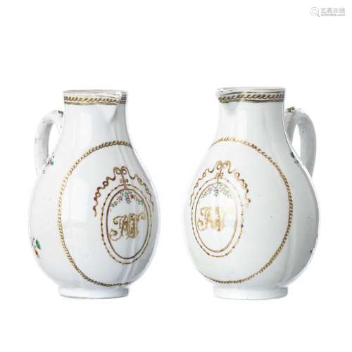 Pair of Chinese porcelain monogrammed milk jugs, Qianlong