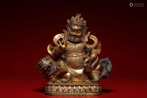 Gilt bronze seated yellow God of Wealth