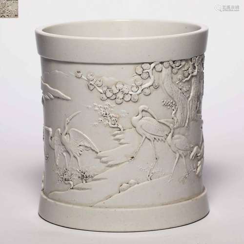 Qing dynasty white glaze pile plastic pen holder