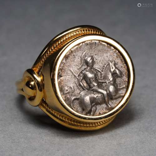 A Silver Coin Gold Mounted Ring