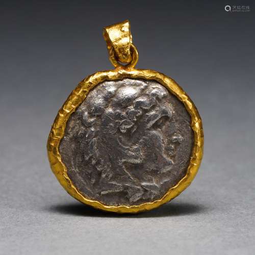 A Silver Coin  Gold Mounted Pendant