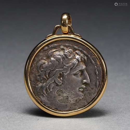 A Silver Coin Gold Mounted Pendant