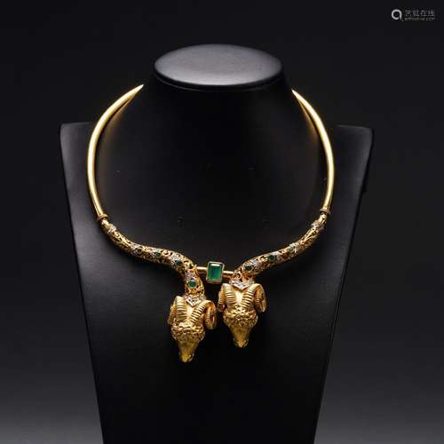 A Diamond and Emerald Decorated Gold Necklace