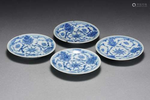 A Set of Four Blue and White Plates