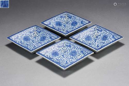 A Set of Four Blue and White Lozenge Plates