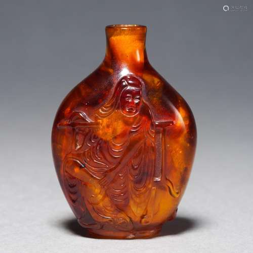 A Carved Amber Snuff Bottle