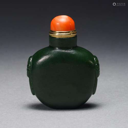 A Carved Jade Snuff Bottle