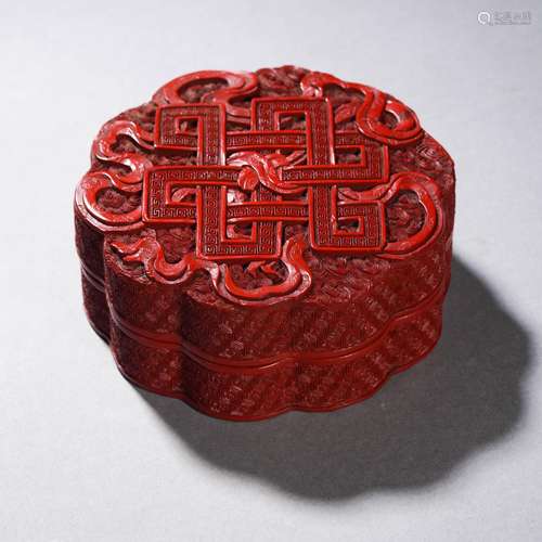 A Carved Cinnabar Lacquer Box with Cover