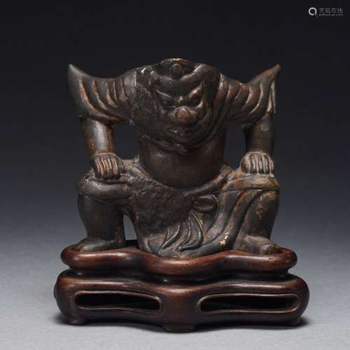 A Bronze Kneeling Figure