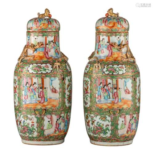 A pair of Chinese Canton lidded vases, 19thC, H 50 cm