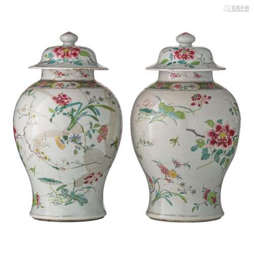 A pair of Chinese famille rose floral decorated covered vase...