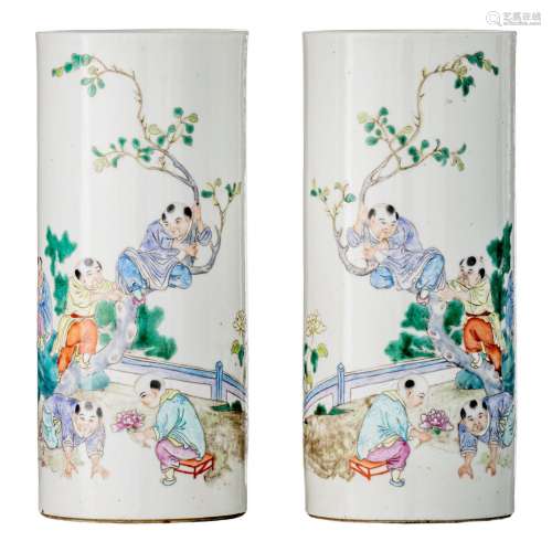A pair of Chinese famille rose 'Playing boys' cylindrical va...