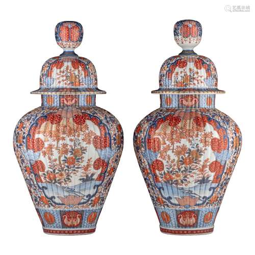 A pair of large Japanese Imari ribbed vases and covers, Edo ...